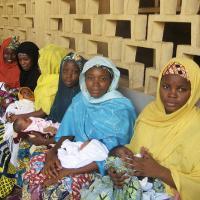 Women waiting for newborn care at a nursery. Women waiting for newborn care at a nursery.